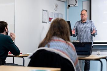 Lecturer in front of class