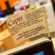 A close-up view of ‘Capri’ desk flag stuck on a PC monitor